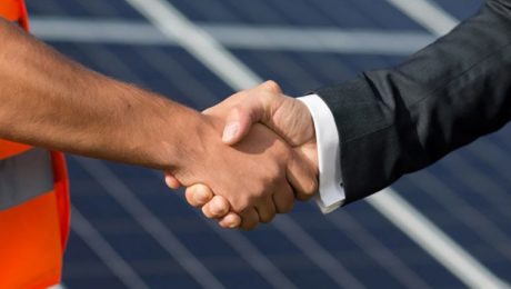 handshake to show drainage contract has been renewed