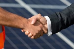 handshake to show drainage contract been signed